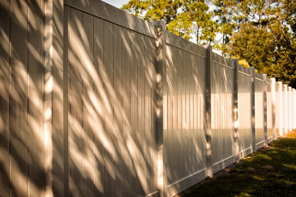 Tan Vinyl Fence Installation in Albany